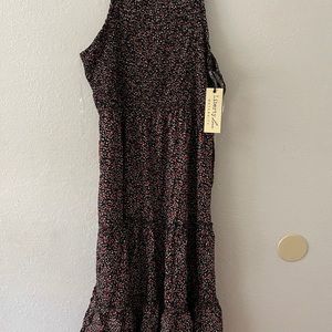 Liberty Love maternity dress in medium. Black dress with small red flowers.